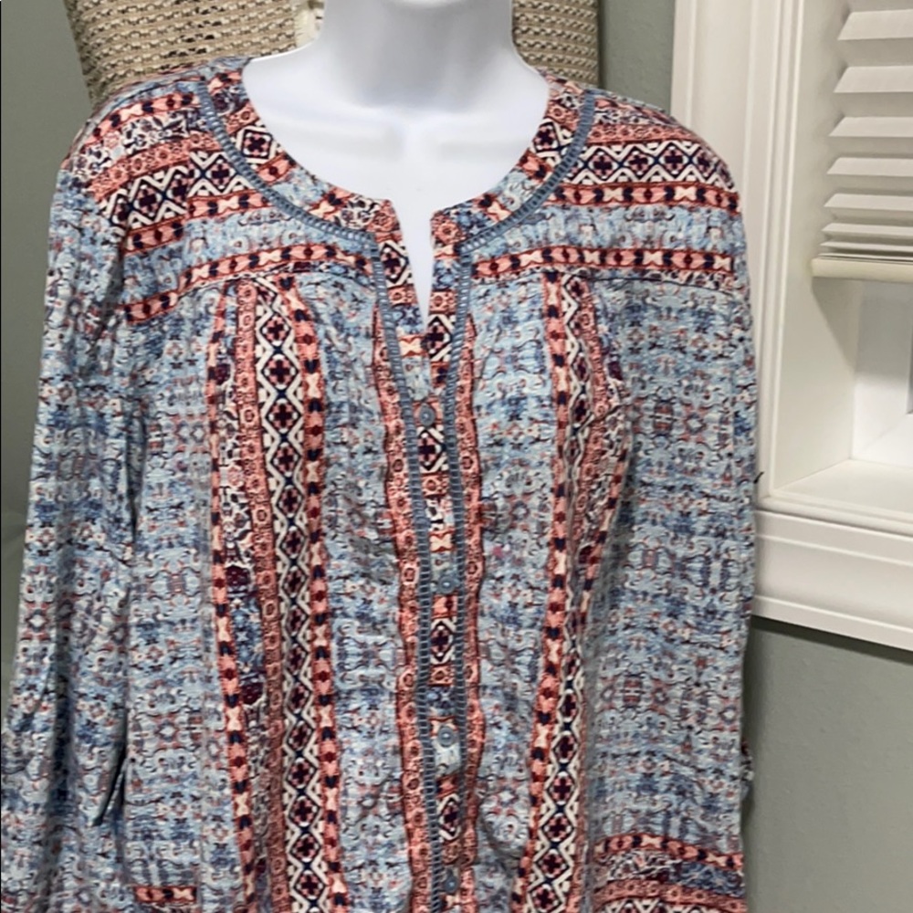 Style & Co relaxed fit v neck with buttons.